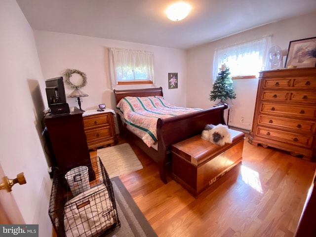 bedroom with light wood-type flooring