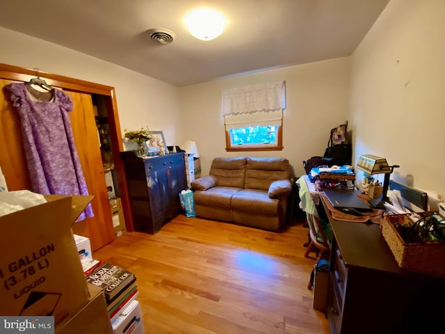 office space with light hardwood / wood-style floors