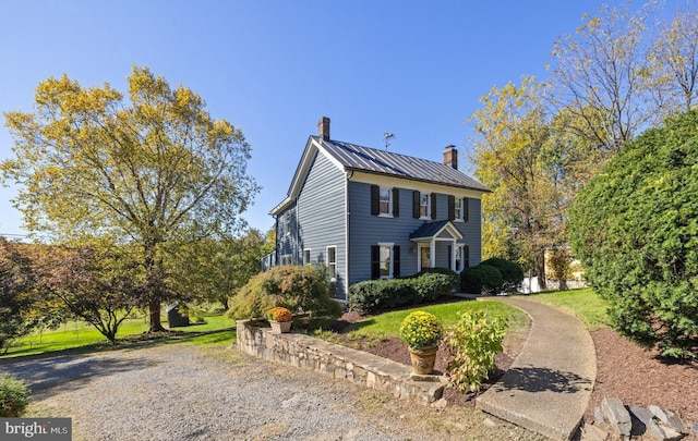 view of property exterior featuring a yard