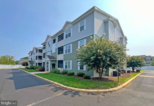 view of property featuring central AC unit