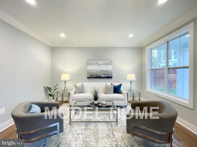 living area with crown molding, wood finished floors, baseboards, and recessed lighting