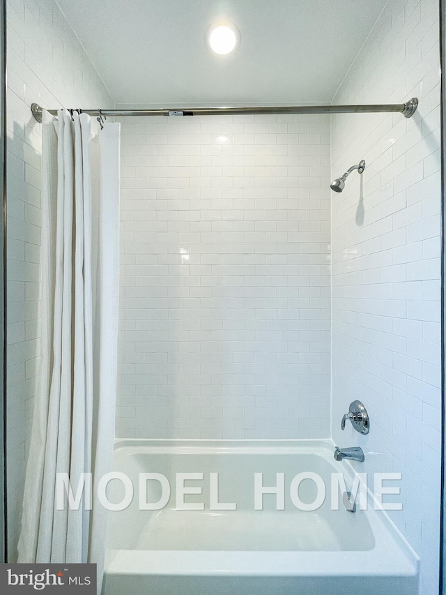 full bath featuring shower / tub combo