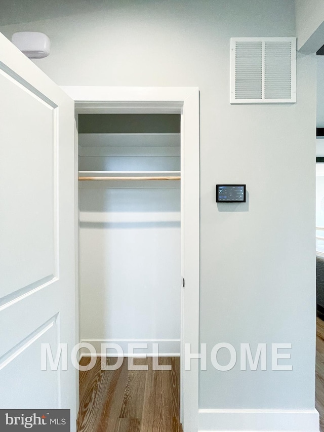 closet featuring visible vents