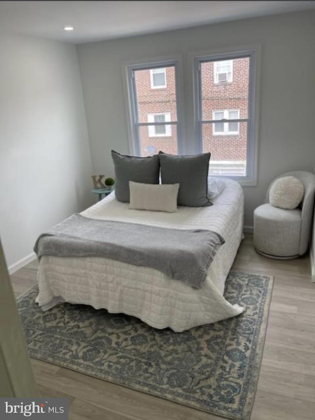 bedroom featuring light hardwood / wood-style floors