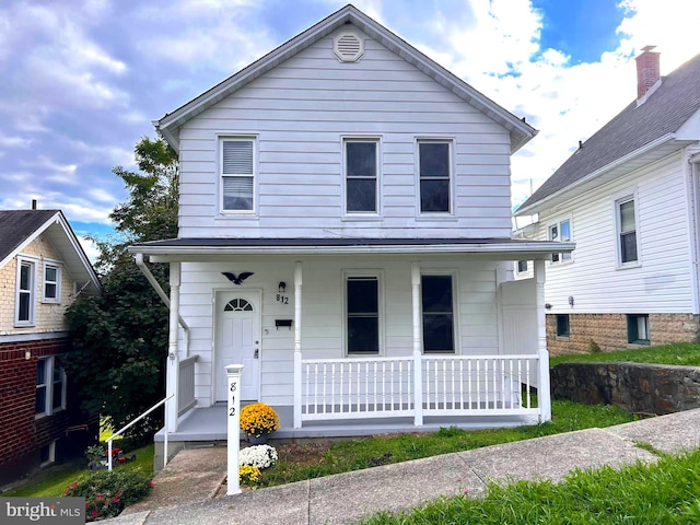 front of property with a porch