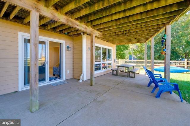 view of patio / terrace featuring a pool