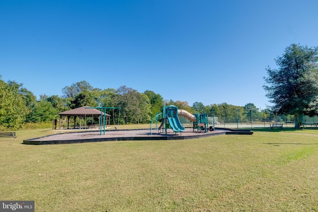 view of jungle gym featuring a gazebo and a lawn