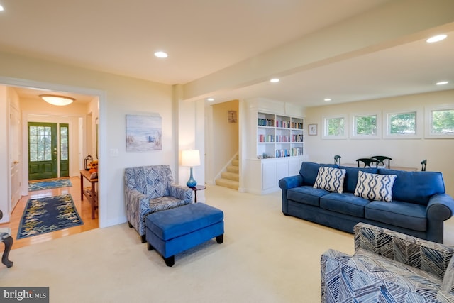 carpeted living room with a wealth of natural light