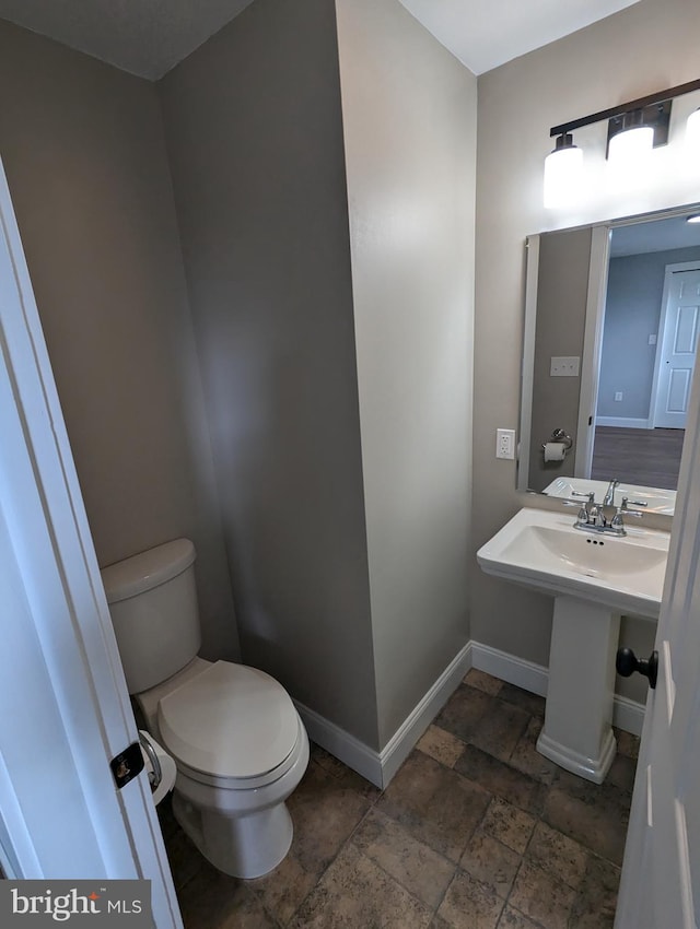 bathroom featuring toilet