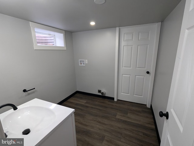 bathroom with vanity and hardwood / wood-style floors