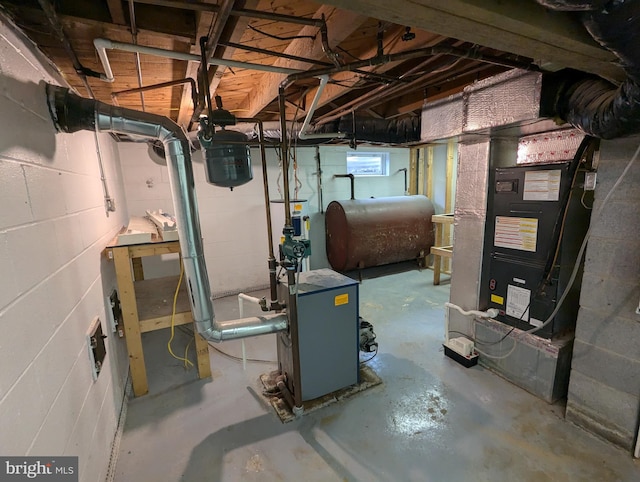 basement featuring heating unit