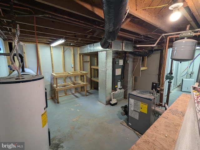 basement featuring electric water heater and heating unit