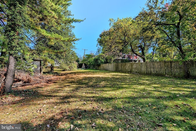 view of yard with fence