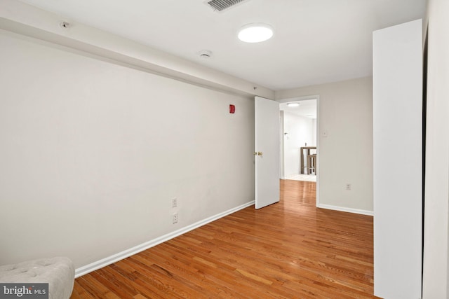 unfurnished room featuring light hardwood / wood-style flooring