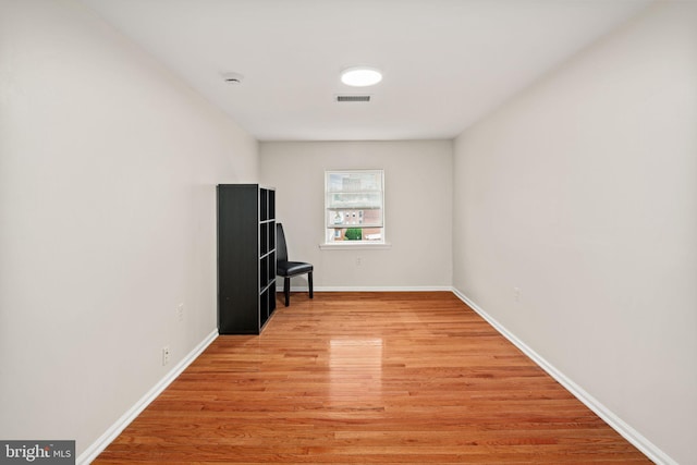 empty room with light wood-type flooring