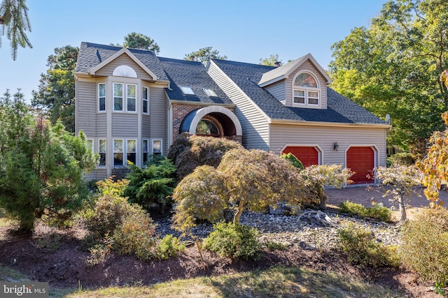 view of front of property featuring a garage