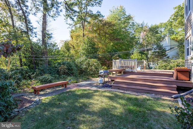 view of yard featuring a deck