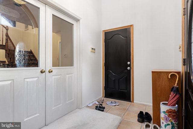 view of tiled foyer entrance