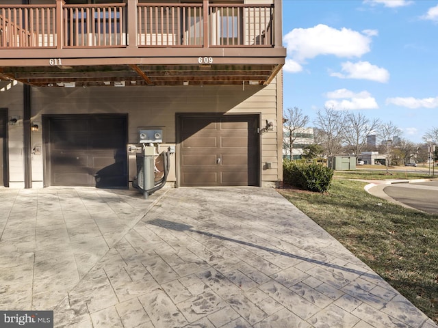 view of side of home with a garage