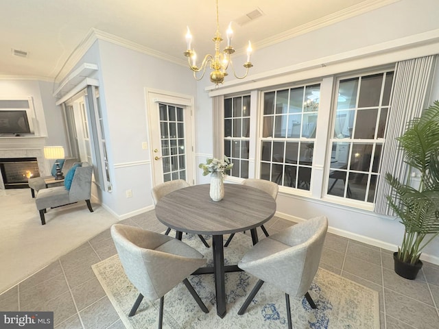 tiled dining room with an inviting chandelier and crown molding