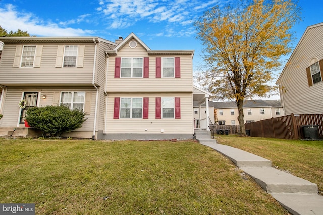 view of front of property with a front lawn