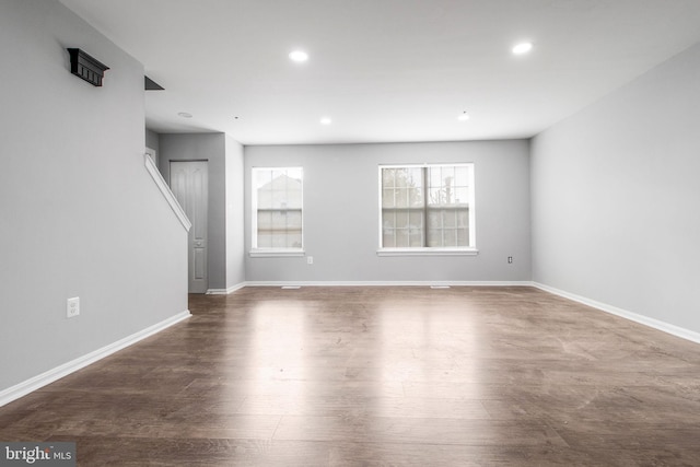 unfurnished living room with hardwood / wood-style floors