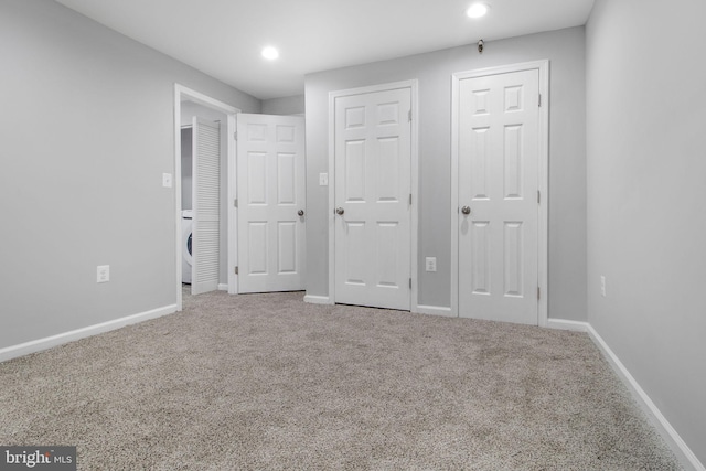 unfurnished bedroom featuring carpet