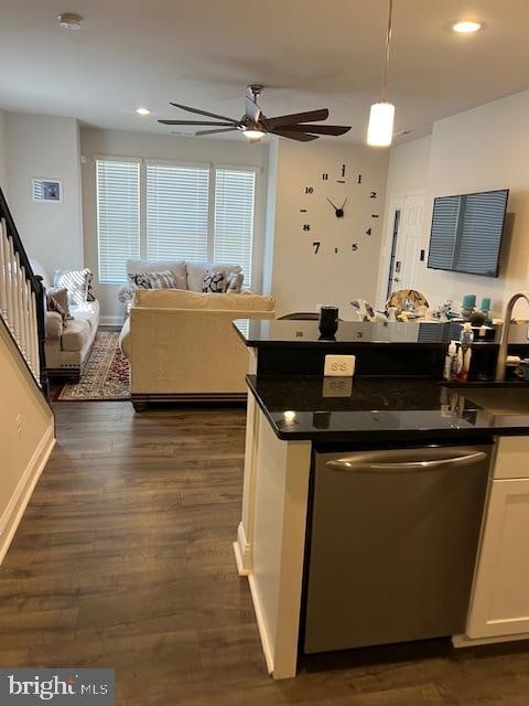 kitchen with dishwasher, dark wood-type flooring, pendant lighting, white cabinetry, and ceiling fan