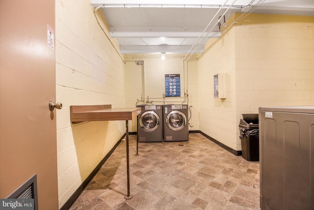 laundry room with washer and dryer