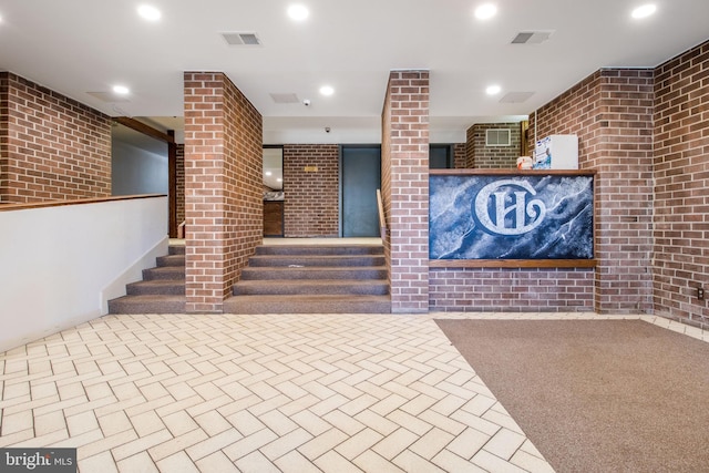 welcome area featuring ornate columns