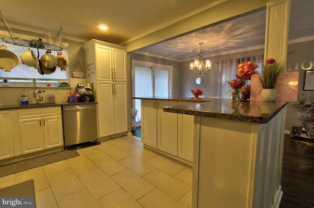 kitchen featuring white cabinets, dark stone countertops, crown molding, decorative light fixtures, and dishwasher