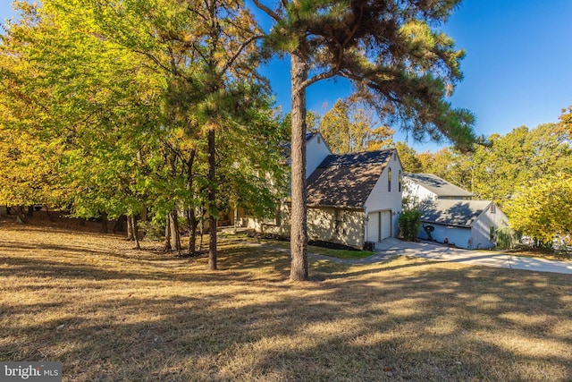 view of home's exterior featuring a yard