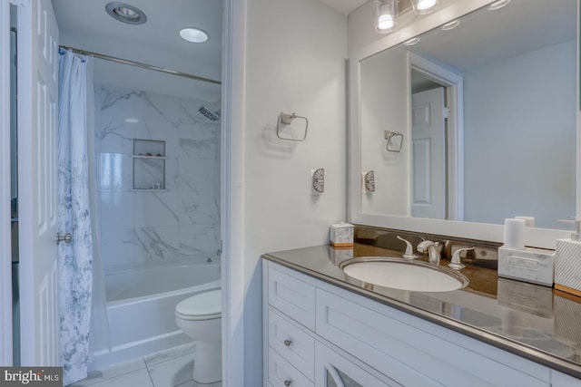 full bathroom featuring shower / bath combination with curtain, vanity, and toilet