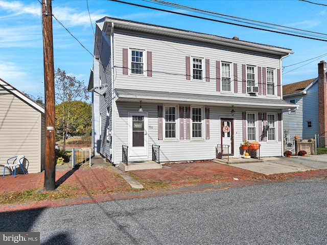 view of front of property featuring cooling unit