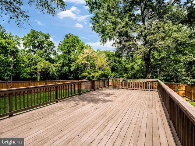 deck featuring a lawn