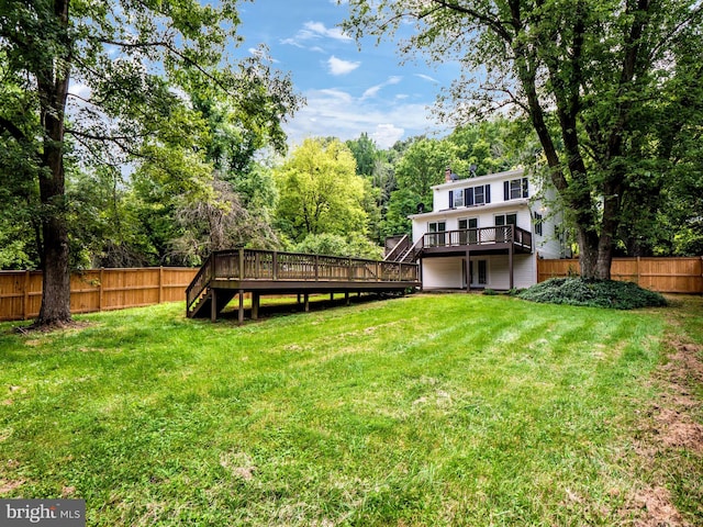 view of yard with a deck