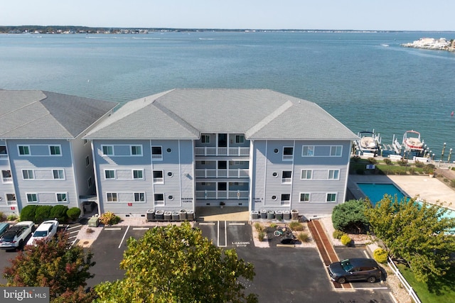 birds eye view of property featuring a water view