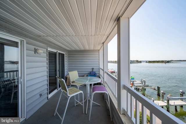 balcony featuring a water view