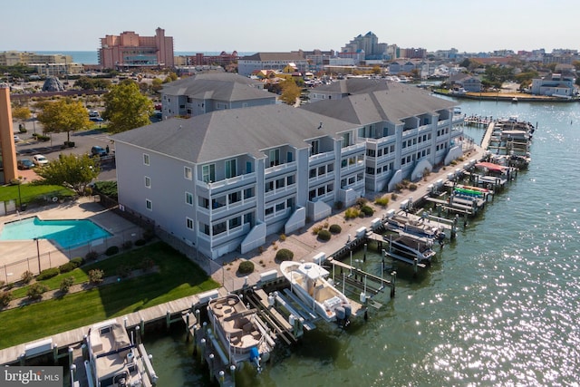 drone / aerial view with a water view