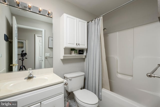 full bathroom featuring vanity, toilet, and shower / bathtub combination with curtain