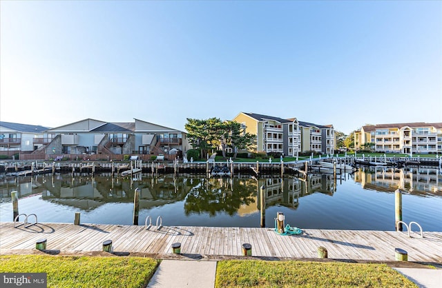 dock area with a water view