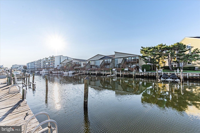 dock area featuring a water view