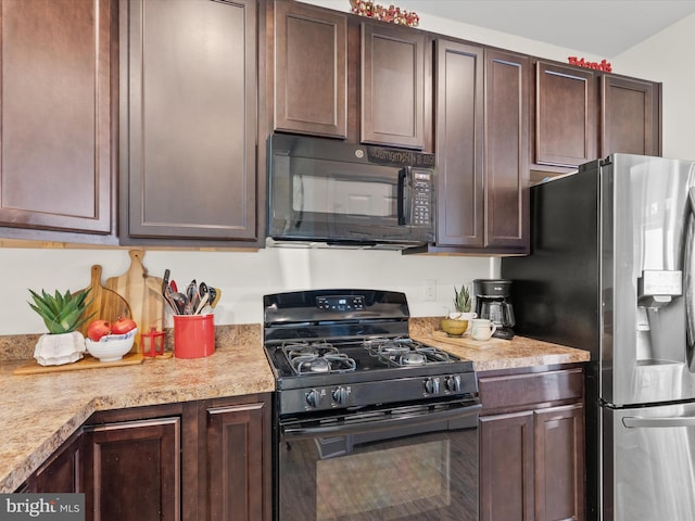 kitchen featuring black appliances and dark brown cabinets