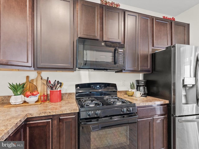 29225 Shady Creek Ln Unit 29, Dagsboro, DE 19939 - kitchen with dark brown cabinetry, black appliances, and light countertops