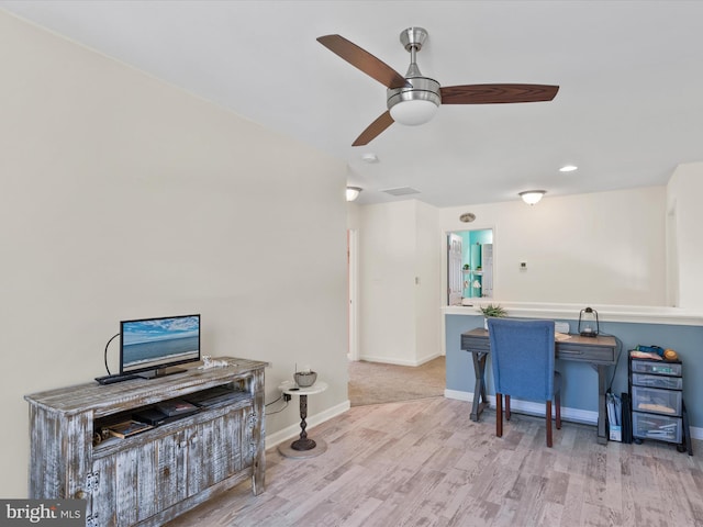 interior space featuring light hardwood / wood-style flooring and ceiling fan