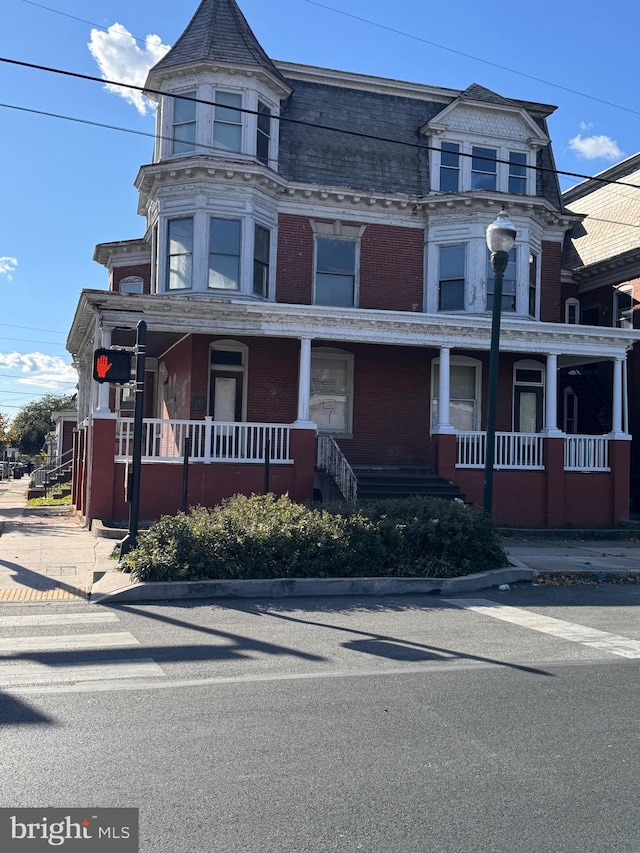 victorian-style house with covered porch