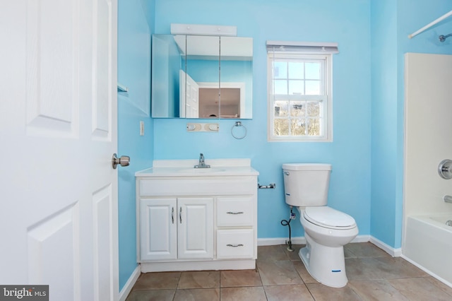 full bathroom with toilet, vanity, tile patterned floors, and washtub / shower combination