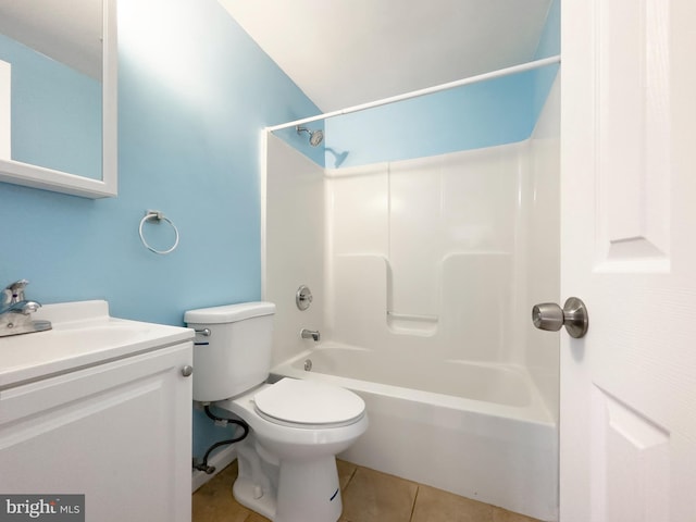 full bathroom with vanity, tub / shower combination, toilet, and tile patterned flooring