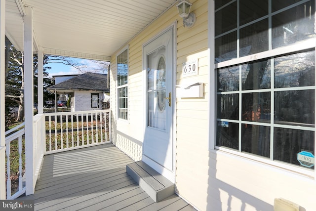 deck featuring covered porch