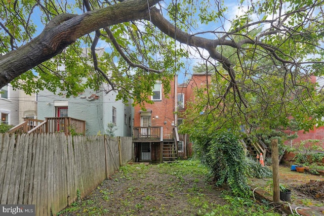 exterior space with stairway and fence